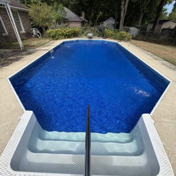 Deep blue inground liner pool cleaned and balanced